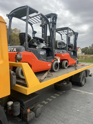 Transport Samochodów I Sprzętu Rolniczo - Budowlanego